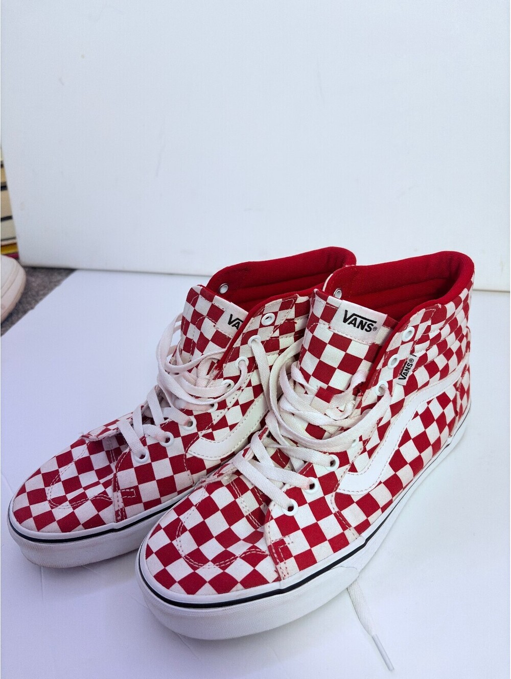 Vans red and white checkerboard high top sneakers